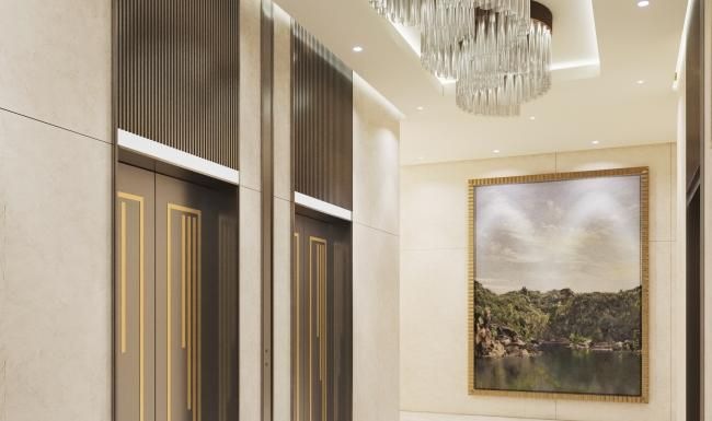 a hallway with a chandelier and elevators