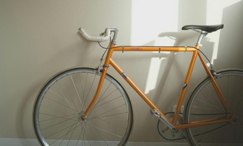 a bicycle parked in a room